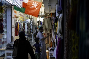 visitors-browse-goods-for-sale-at-the-al-seeb-souq-in-muscat-oman